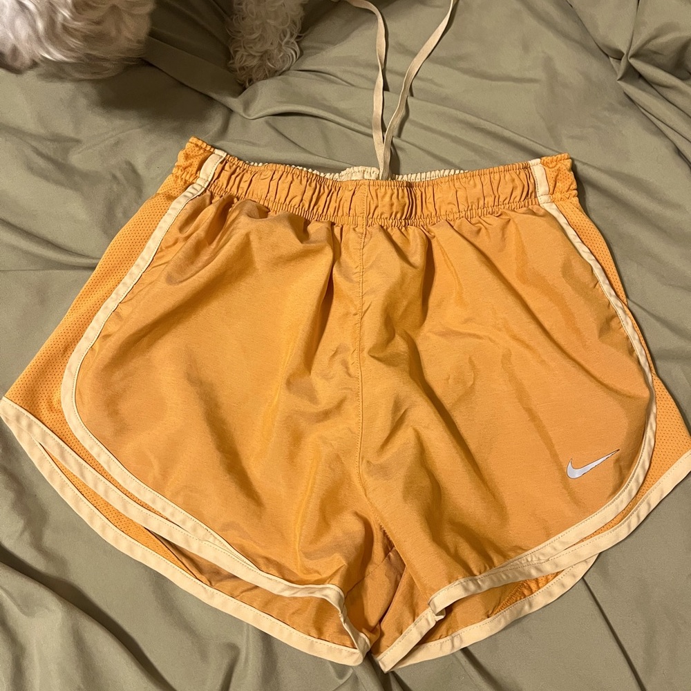 Orange Nike shorts